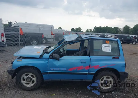 1994 Geo Tracker from USA, damaged, VIN 2CNBJ18U5R6945044